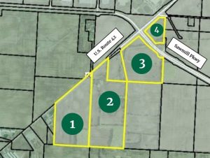 A map with the road name labels of U.S. Route 42 on the left and Sawmill Parkway on the right. Four parcels of land are outlined in yellow and labeled with numbers 1, 2, 3 and 4 to indicate which are the parcels that are being purchased.